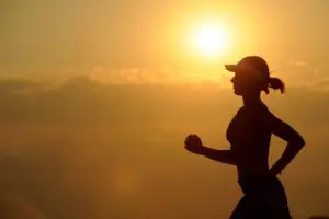jogger running sunset